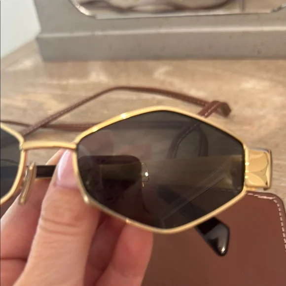 Celine Gold and Black Sunglasses with Sleek Design - Picture 3 of 6